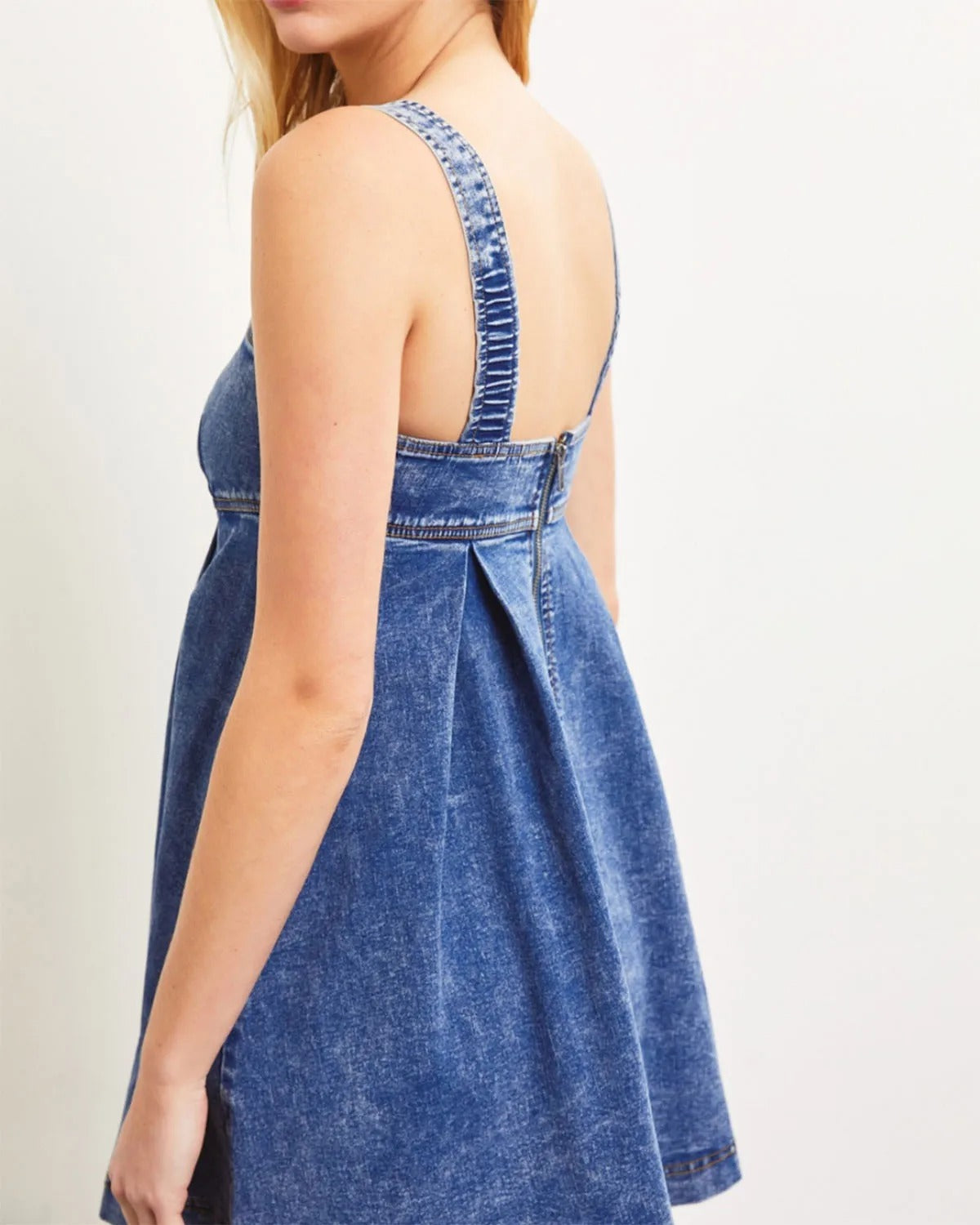 Blue denim mini dress with square neckline and wide straps