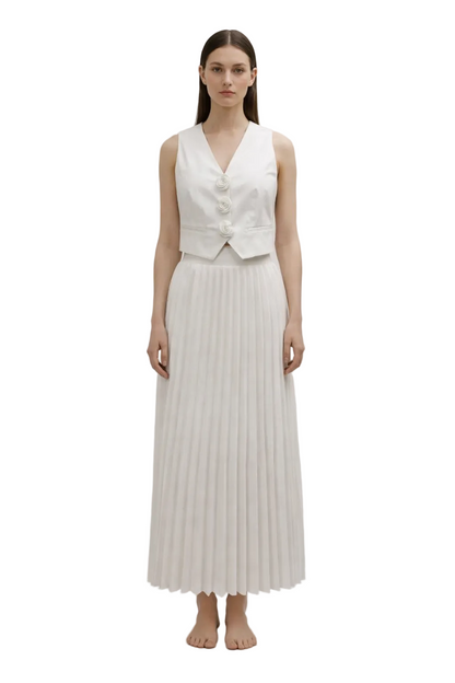 Off-white two-piece set with pleated skirt and sleeveless buttoned top