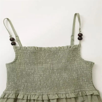 Light green smocked maxi dress with thin straps
