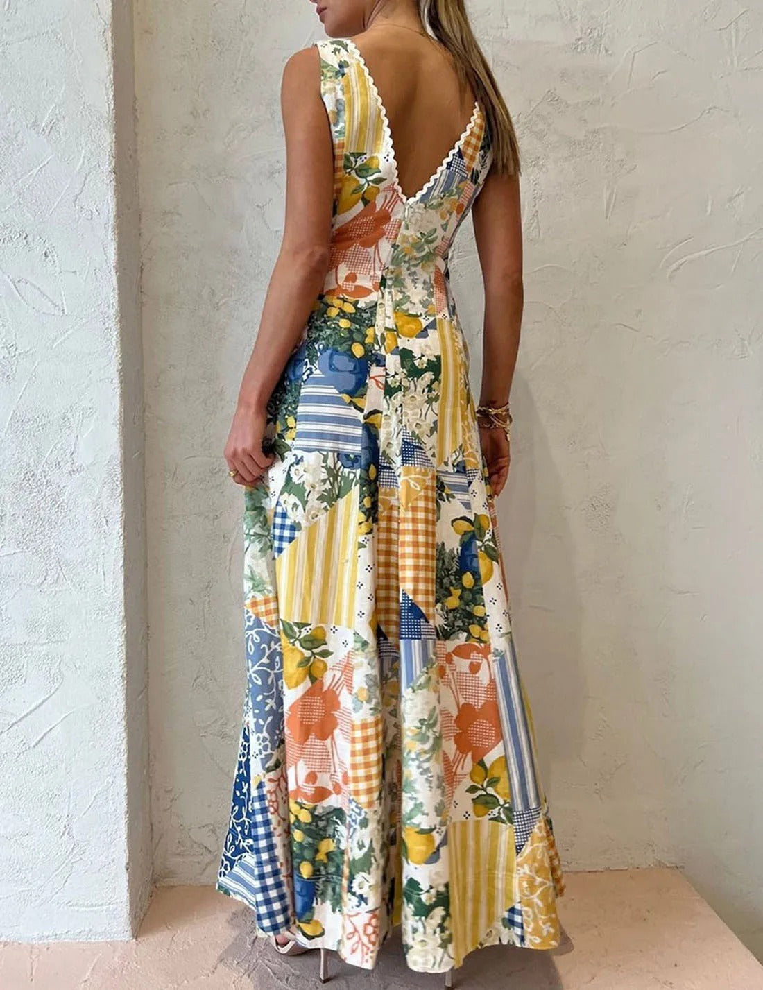 White patchwork print maxi dress with deep V-neck