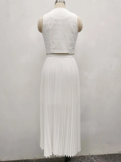 Off-white two-piece set with pleated skirt and sleeveless buttoned top